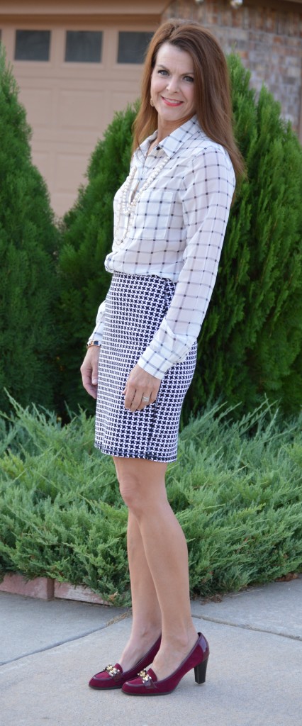 Houndstooth skirt, windowpane blouse + burgundy heels & pearls