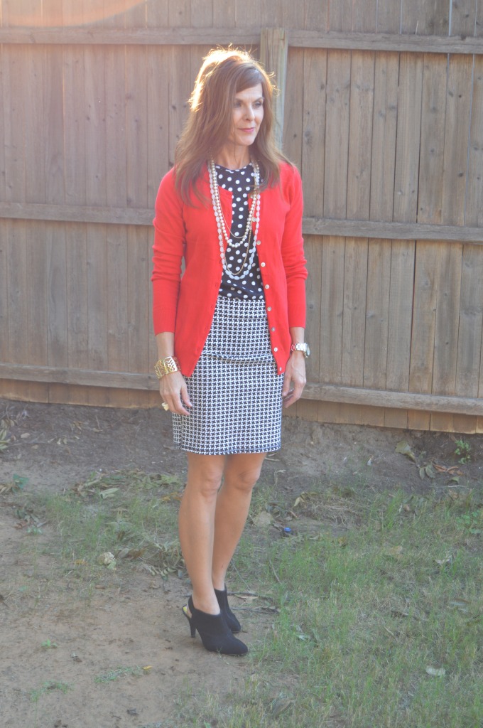 Houndstooth skirt, polka dot top, red cardigan + black shooties