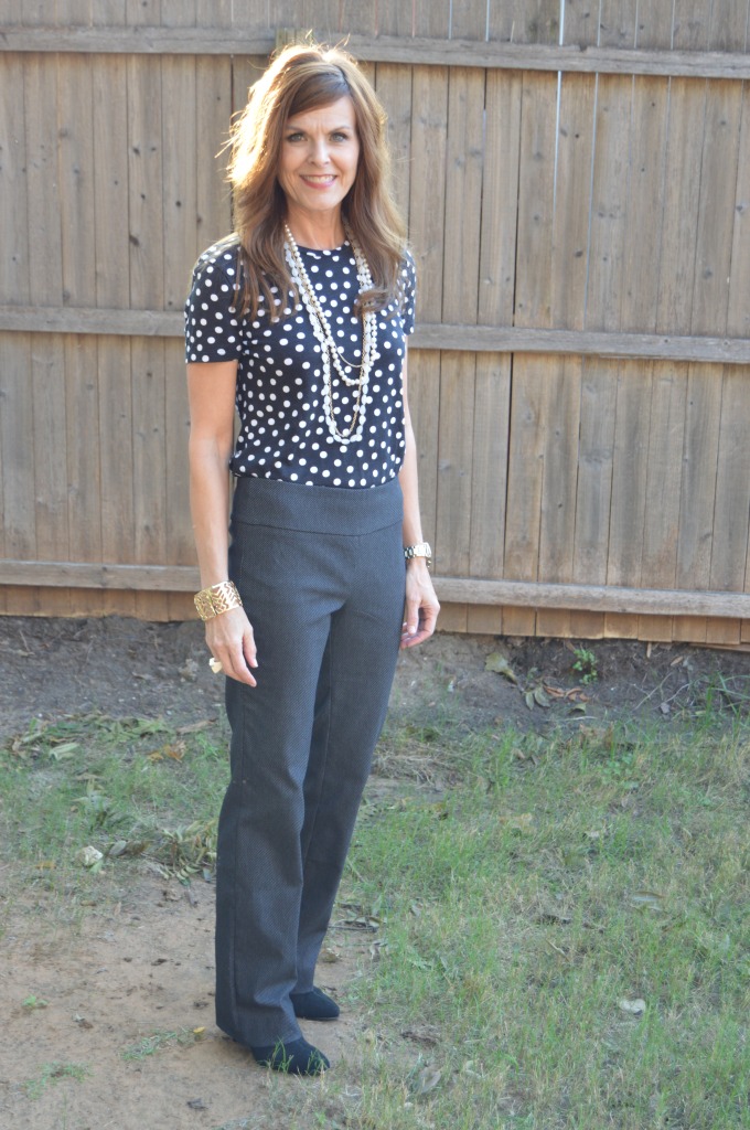 Black/grey pants, polka dot top + shooties
