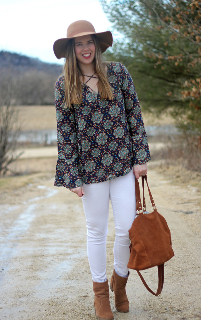 Feeling Boho with Knitted Belle Boutique: paisley tie top with belle sleeves, white jeans, floppy hat, brown booties, brown bag | Puppies & Pretties